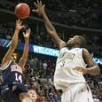University of Richmond senior guard Kevin Anderson shoots a floater, the eventual game-winner, with seconds left in the second half of an NCAA men's basketball tournament game at Pepsi Center in Denver on Thursday, March 17, 2011. The Spiders won 69-66. (Anna Kuta/The Collegian)