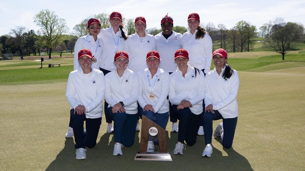 <p>The women's golf team poses with its second place trophy at the Patriot League Championship on April 17. Photo courtesy of Richmond Athletics.</p>