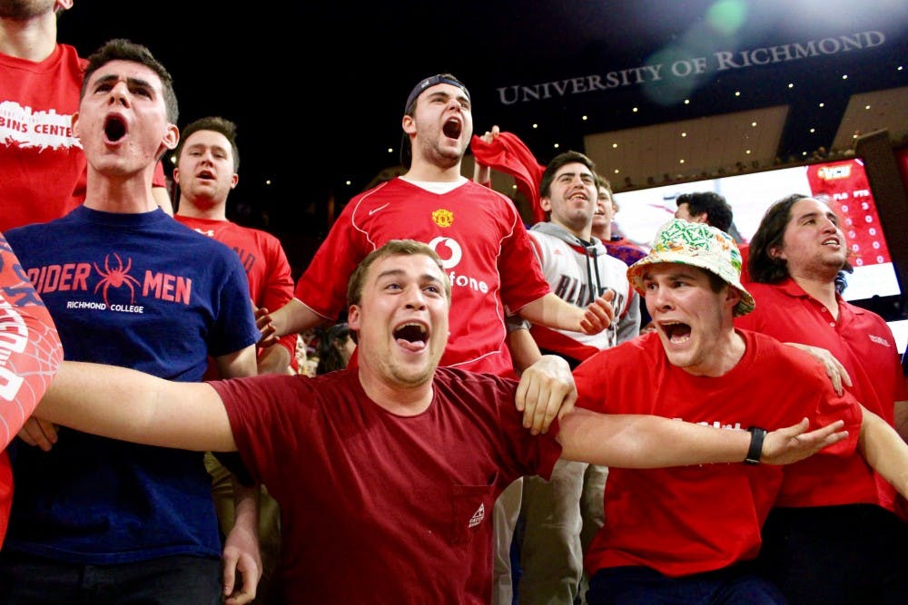 The UR student section goes crazy after Buckingham dunks to put the Spiders on the board in the first half.