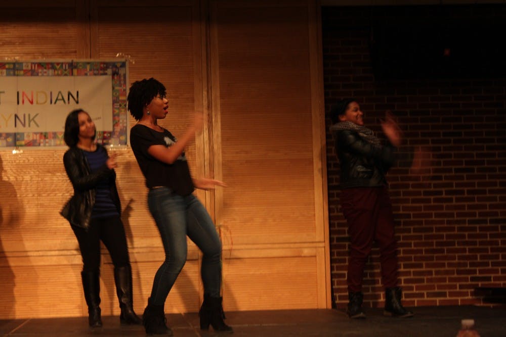 Three students competed for a crown in West Indian Lynk's eighth annual Island Showcase on Friday. Competitors educated the audience and a panel of judges about different West Indian countries through song, dance and poetry. Bria Munnings, president of West Indian Lynk, said the organization largely acts as a support group, but this event is an opportunity for students connected to the West Indies to celebrate and share their culture. Photos by Kayla Solsbak.