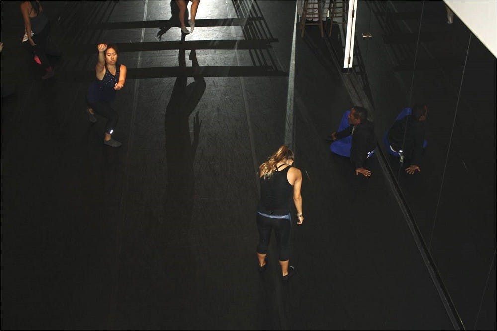 The University Dancers had the opportunity to work closely with choreographer Nathan Trice as he created a premiere dance piece for the dancers’ annual spring concert, Momentum.’Nathan Trice, who is a professional performer and teacher, has worked for major companies, ranging from MOMIX, Complexions Contemporary Ballet, Joseph Holmes Chicago Dance Theater, Kevin Iega Jeff, Donald Byrd/The Group and Forces of Nature Dance Company.He then decided to launch his own company, Nathan Trice Rituals, a project-by-project dance theater, which was a platform to explore social, political or aesthetics ideas, he said.Trice’s mission is to serve those who seek the reflective importance of being human through artistic work that examines contemporary and historical dynamics of gender, identity and culture, said Anne Norman Van Gelder, who is the artistic director for University Dancers.Trice, who was in residence for 10 days until Thursday, Sept.17, held intensive rehearsals, in addition to working with as many dancers and students as his work allowed, Gelder said.Photos and Preface by Catherine McTiernan