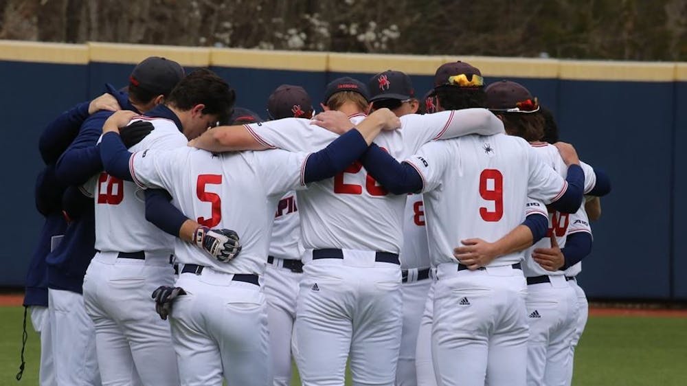 <p>The University of Richmond's baseball team huddles during the last game of the series against Villanova University on March 27. Photo courtesy of Richmond Athletics.</p>