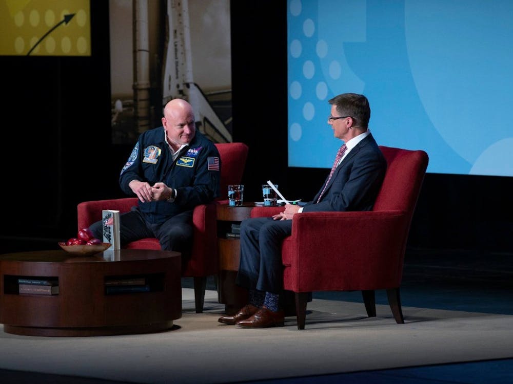Former NASA astronaut Captain Scott Kelly talks with the executive producer and director of The Richmond Forum, Bill Chapman. Photo courtesy of The Richmond Forum.
