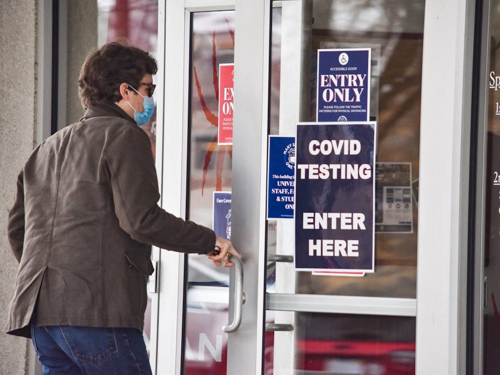 A student enters the Special Programs building, where prevalence tests were administered in spring 2021. UR will not offer prevalence testing in 2022. Photo by Ethan Swift.