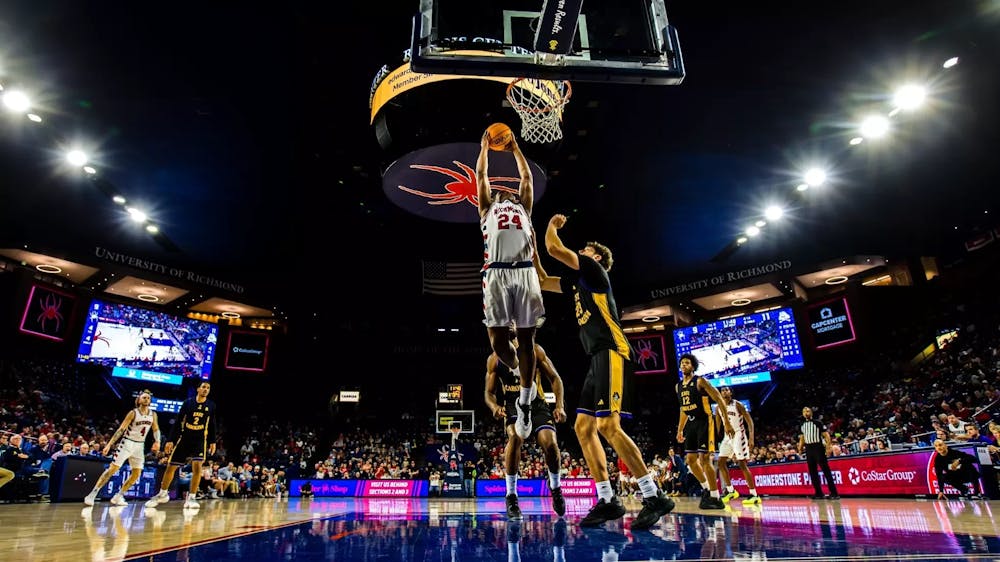 Redshirt first-year forward Jaylen Robinson with a game-tying dunk vs. East Carolina University. Courtesy of Richmond Athletics