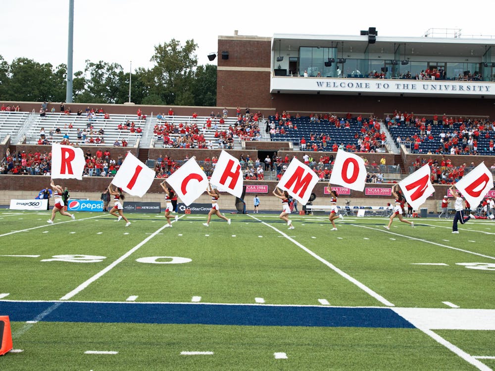 Cheerleaders spread Richmond banner across the field on Sept. 10.