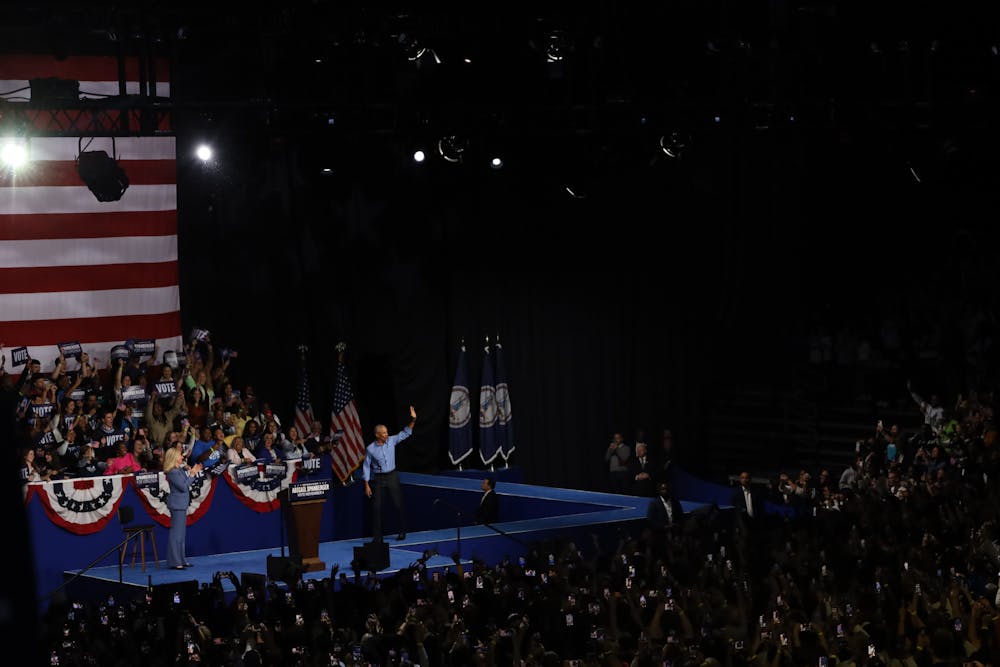 Former President Barack Obama and gubernatorial candidate Abigail Spanberger wave to the crowd at a campaign rally in Norfolk on Saturday, Nov. 1.