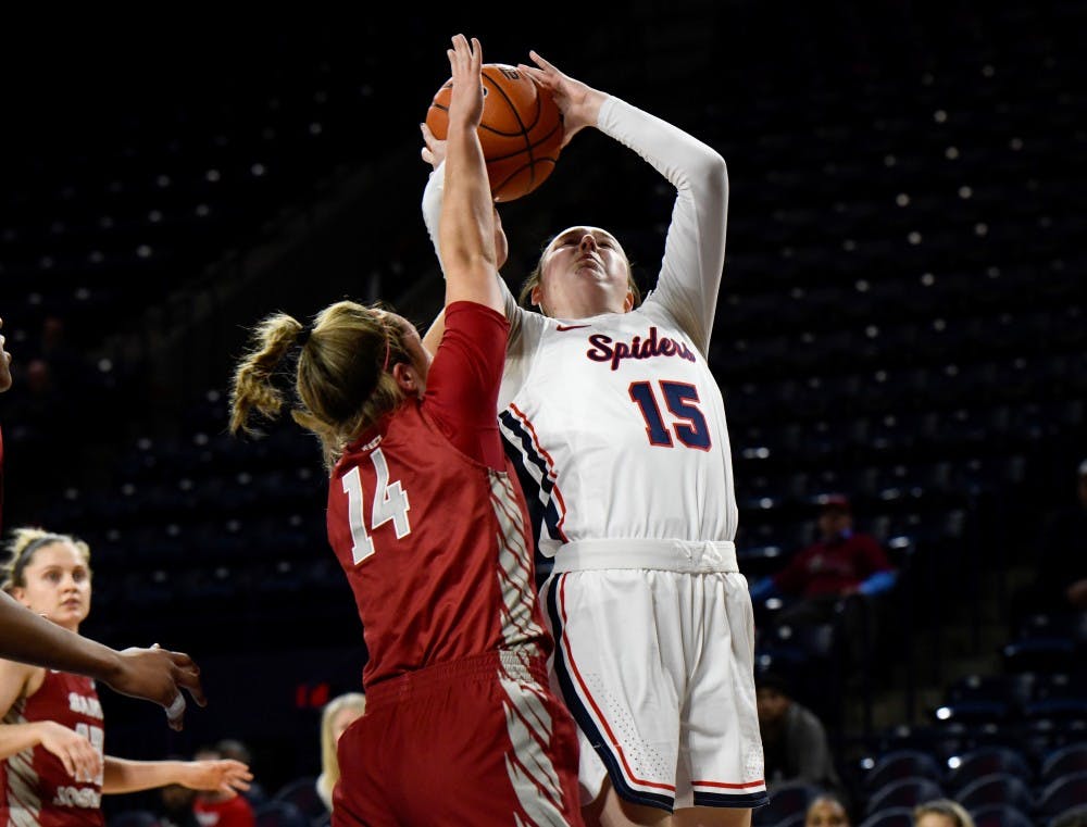 <p>First-year forward Emma Squires takes a shot at a Wednesday night game against Saint Joseph's University.</p>