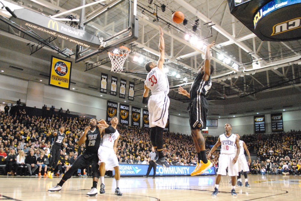 Alonzo Nelson-Odada attempts to block a shot during the Spider's 64-55 upset over VCU.