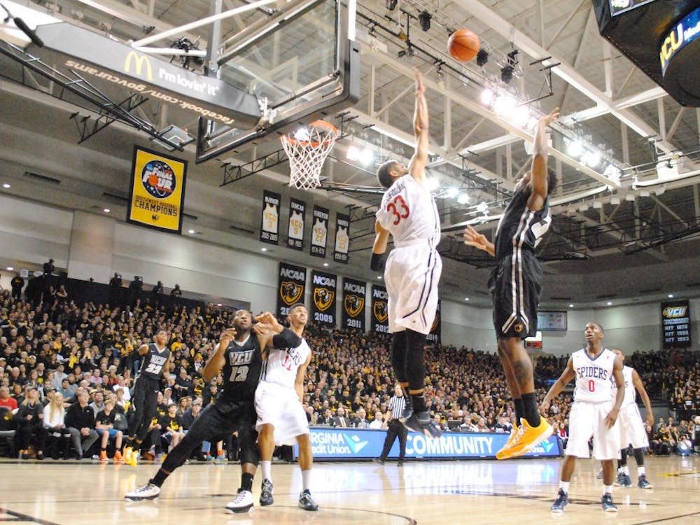 Alonzo Nelson-Odada attempts to block a shot during the Spider's 64-55 upset over VCU.