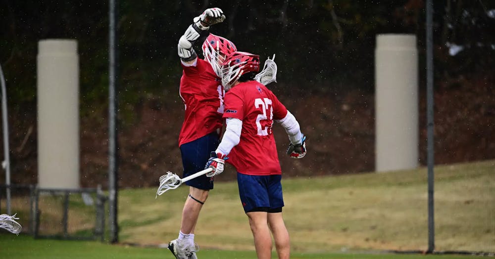 <p>Sophomore attacker Lucas Littlejohn and another Richmond player celebrating a goal. Courtesy of Richmond Athletics</p>