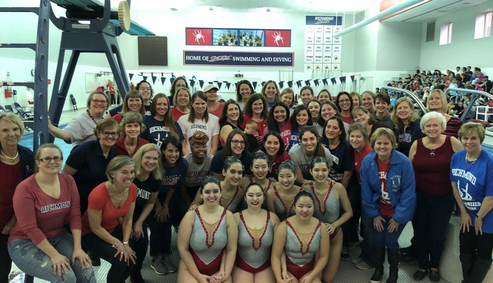 <p>The synchronized swimming team surrounded by its coaches and alumae this past weekend.&nbsp;</p>