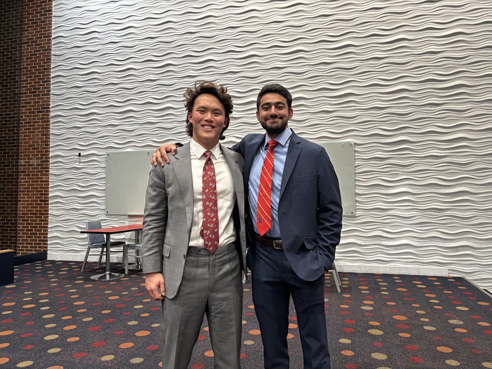 RCSGA presidential candidates Tim Khoh, left, and Sassan Fahim, right, after the presidential debate.