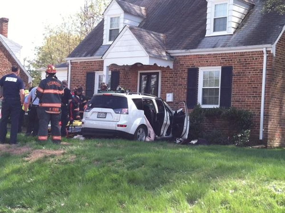 <p>The Outlander jumped the median, ran through a fence and hit the front of a home across, according to reports. <a href="https://twitter.com/RichmondPolice/status/587701155578388480">Photo courtesy of Richmond Police Department</a>.</p>