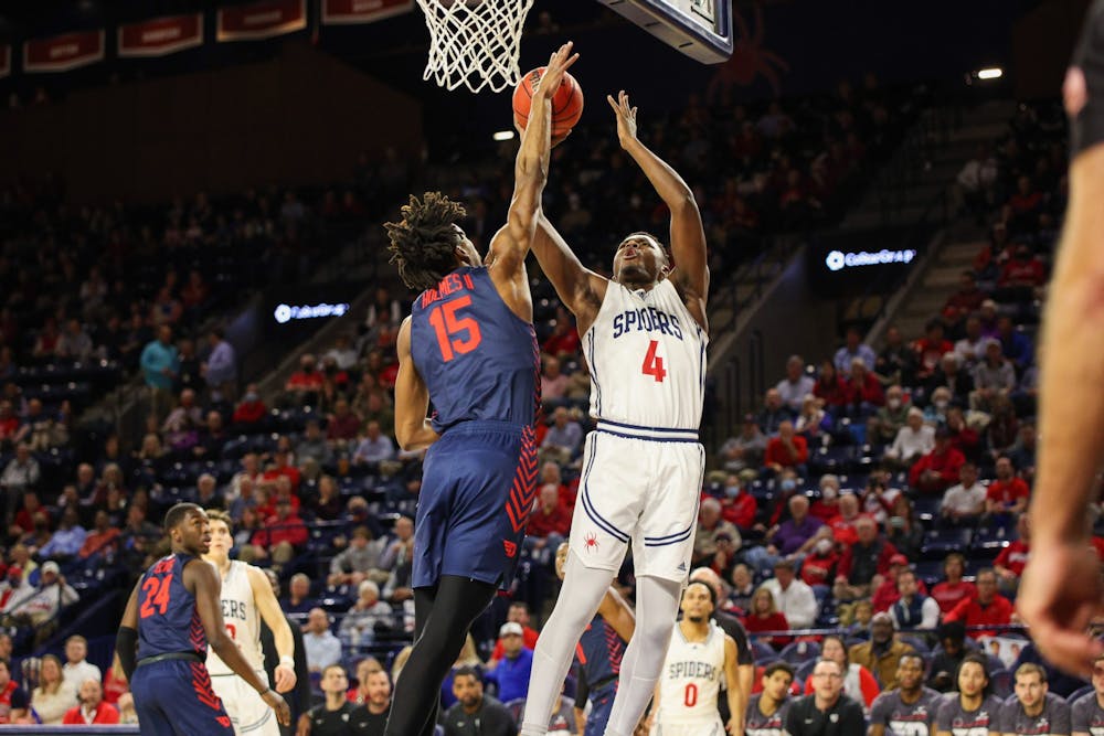 <p>Graduate forward Nathan Cayo goes for a layup in the University of Richmond's game against Dayton on March 1.&nbsp;</p>