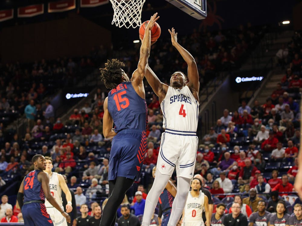 Graduate forward Nathan Cayo goes for a layup in the University of Richmond's game against Dayton on March 1.&nbsp;