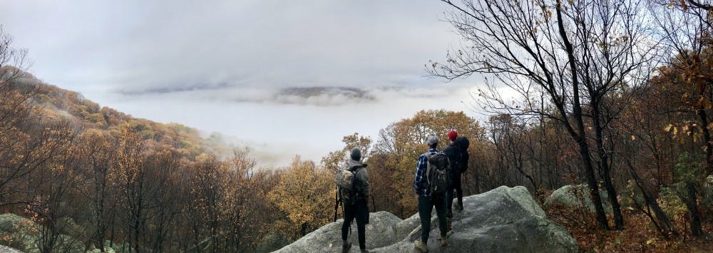 <p>Students stand at Old Rag Mountain's summit.&nbsp;</p>