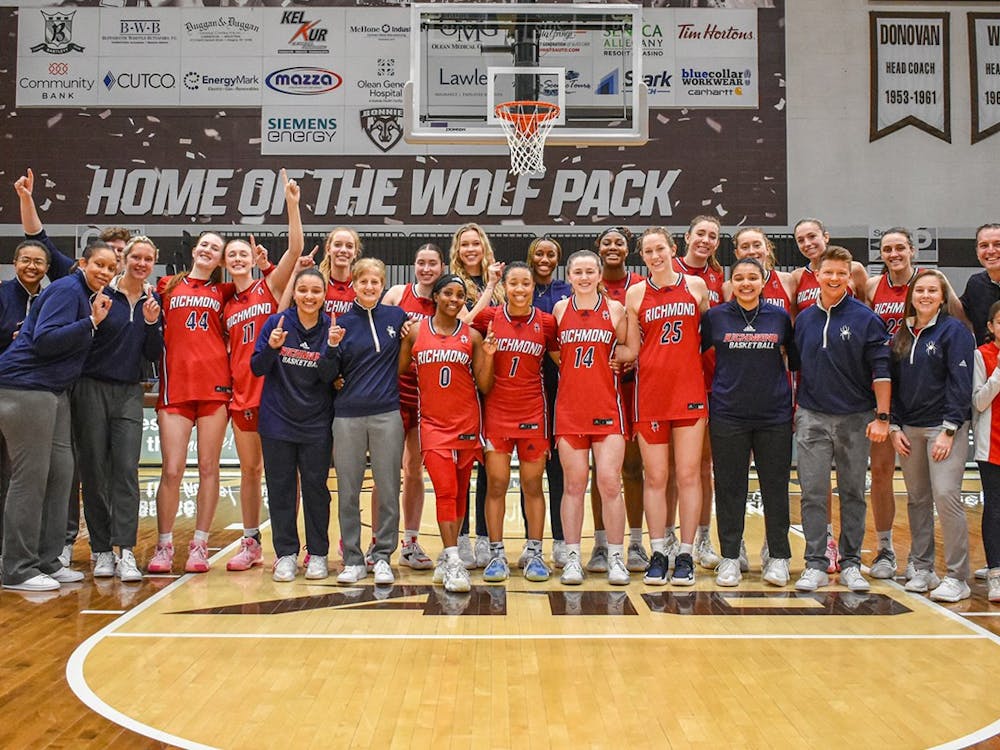 The women’s basketball team celebrated the end of the regular season after a 61-46 away victory against St. Bonaventure University on March 2. Courtesy of Richmond Athletics.