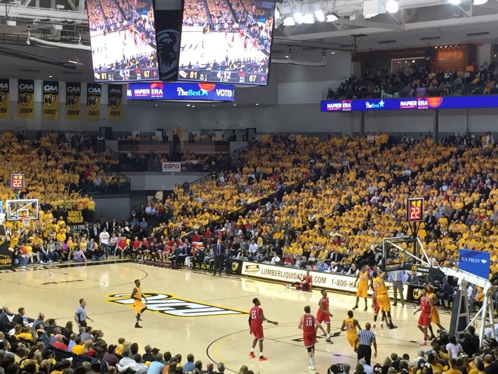 <p>The Siegel Center was full of gold as the VCU Rams dunked all over the Spiders Friday night. </p>