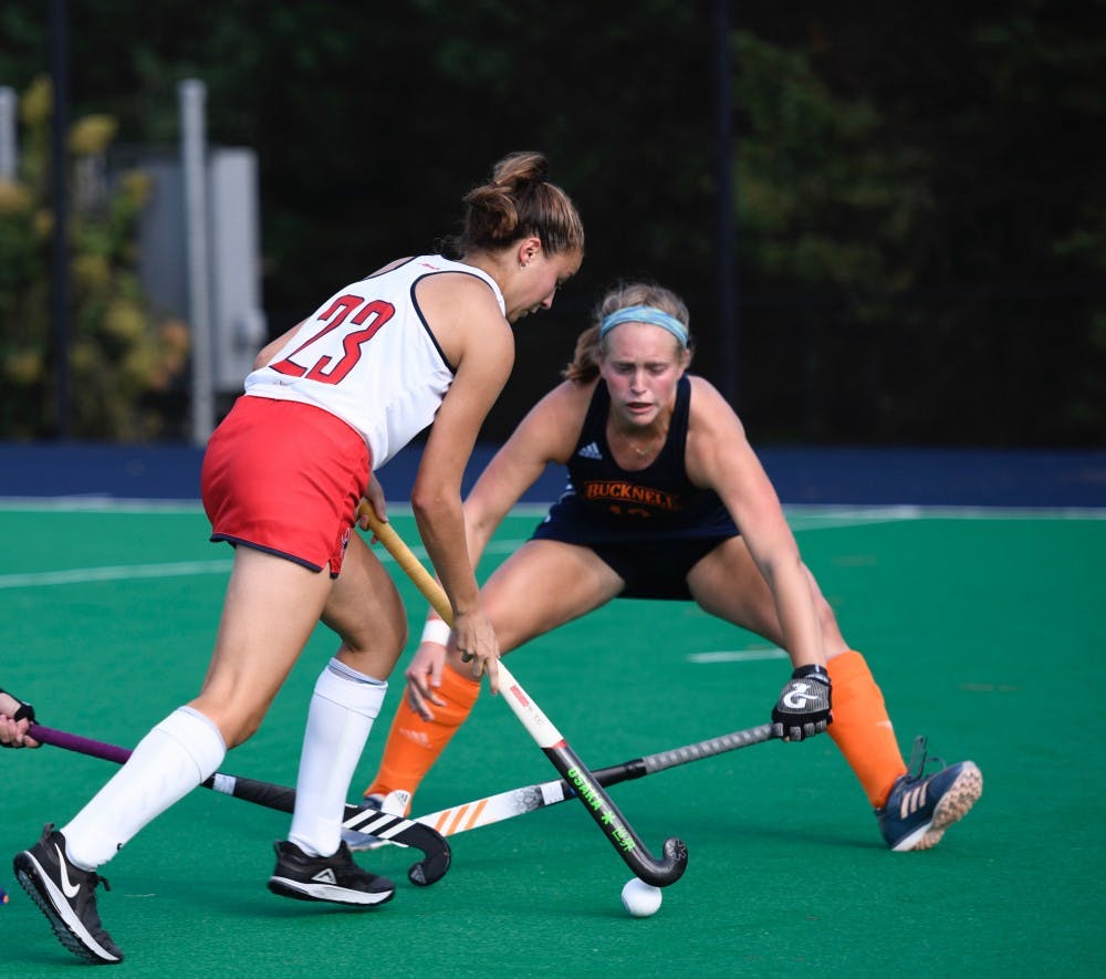 <p>First-year midfielder Lindsey Frank avoids Bucknell University defense during Sunday's game.&nbsp;</p>