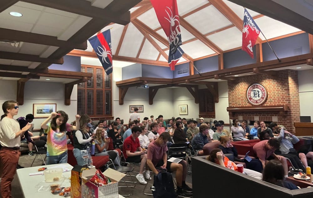 Students gather in the Whitehurst Living Room to watch the presidential debate on Tuesday night.