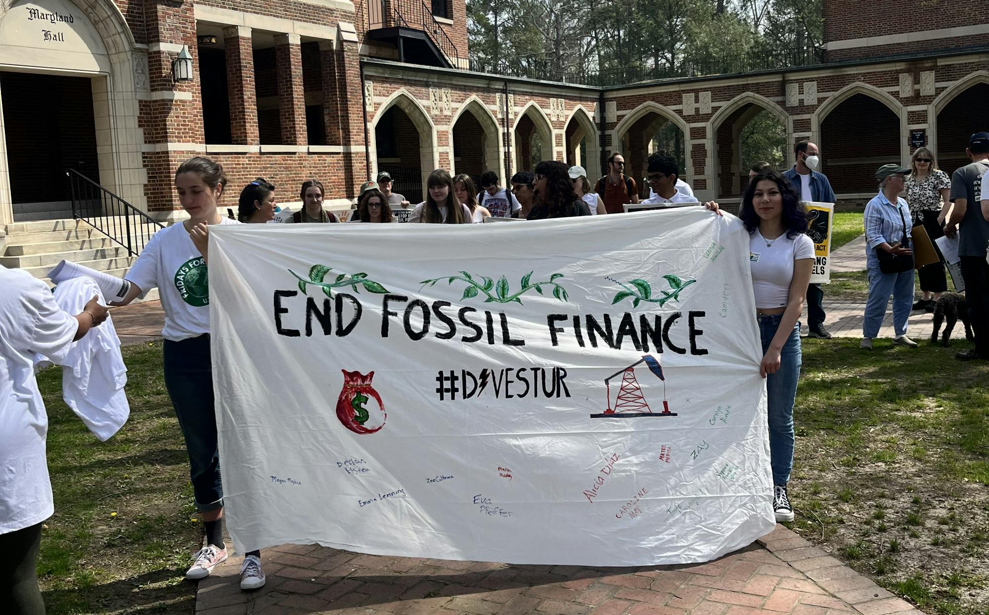 Students during a protest to stop UR from investing the endowment in oil, coal and fossil by 2030 on March 25. Photo courtesy of Eva Pfeiffer.&nbsp;