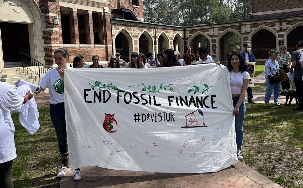 <p>Students during a protest to stop UR from investing the endowment in oil, coal and fossil by 2030 on March 25. Photo courtesy of Eva Pfeiffer.&nbsp;</p>