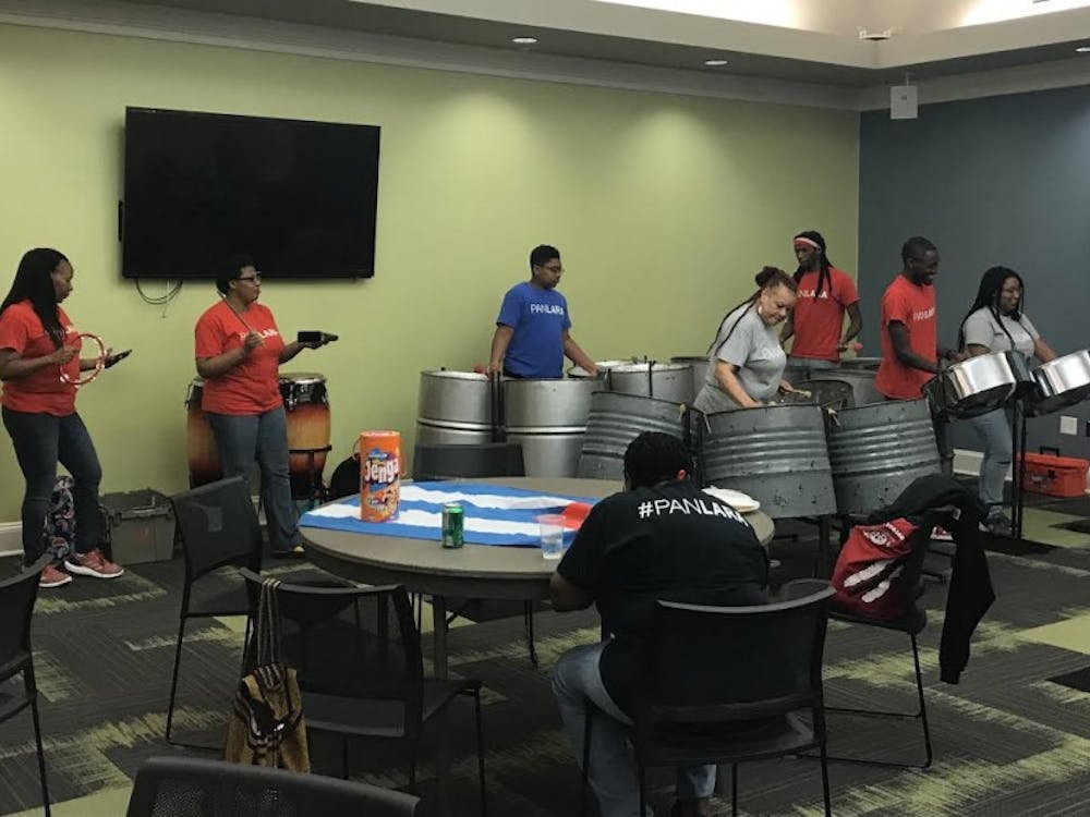 PanLara plays the steel pans at West Indian Lynk's Limin’ Out event.