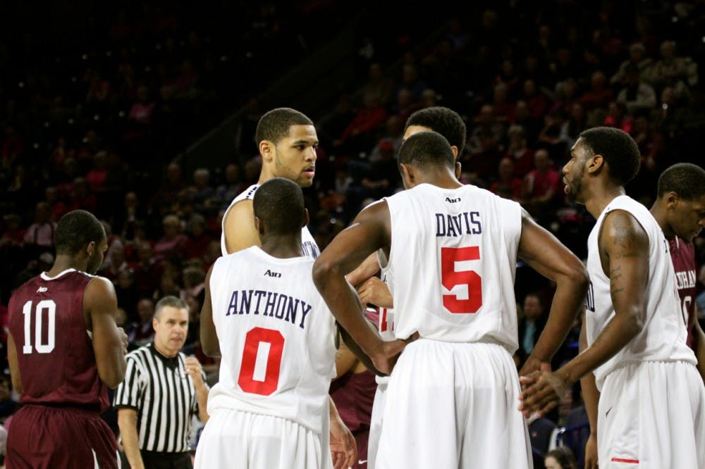 <p>Members or the Richmond Spiders basketball team huddle up during a game against Fordham last season.</p>