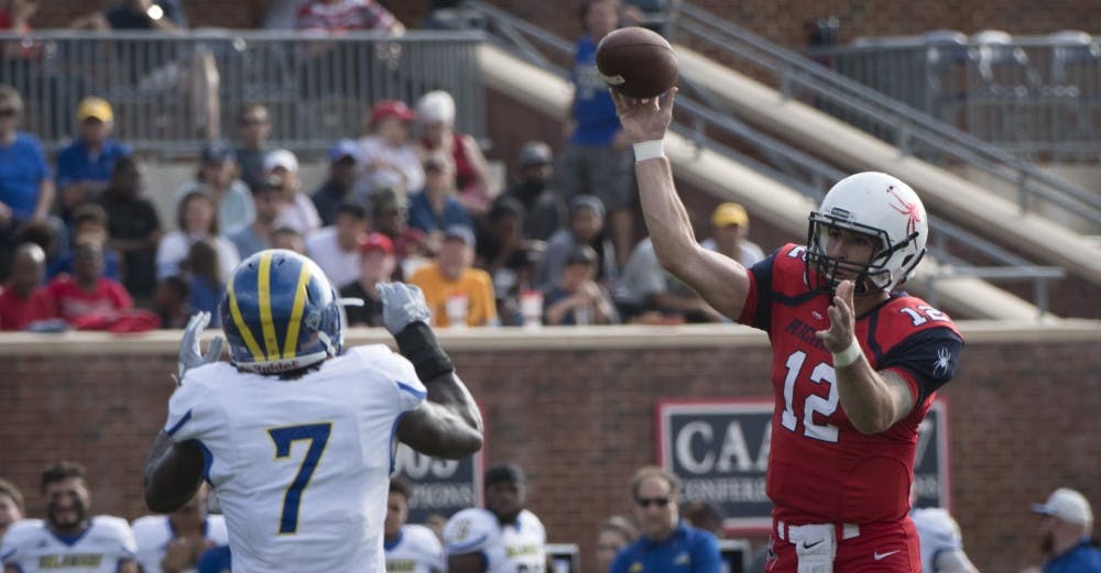 <p>Redshirt sophomore quarterback Joe Mancuso throws a pass in Saturday's loss to Delaware at Robins Stadium. Mancuso set a school record with 560 total yards.</p>