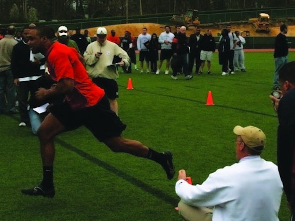 DE Sherman Logan completes the cone drill.