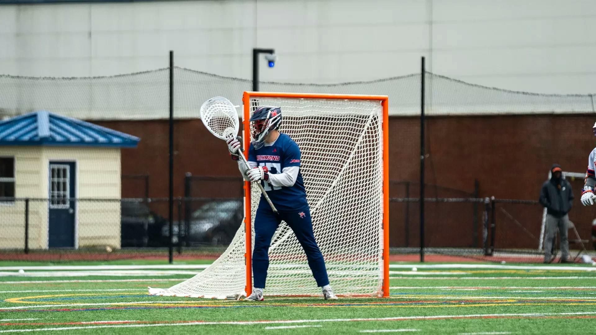 Goalie Zach Vigue defends goal against Hobart. Courtesy of Richmond Athletics