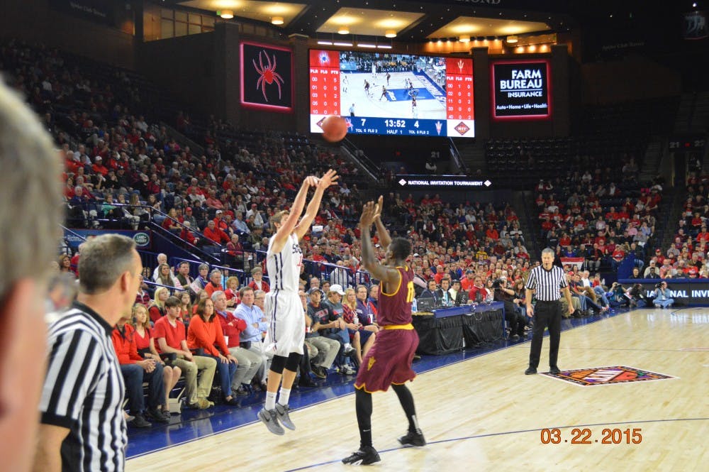 <p>TJ Cline makes a 3-pointer early in the second half of Richmond's NIT game against Arizona State. The Spiders lead by one at halftime. </p>