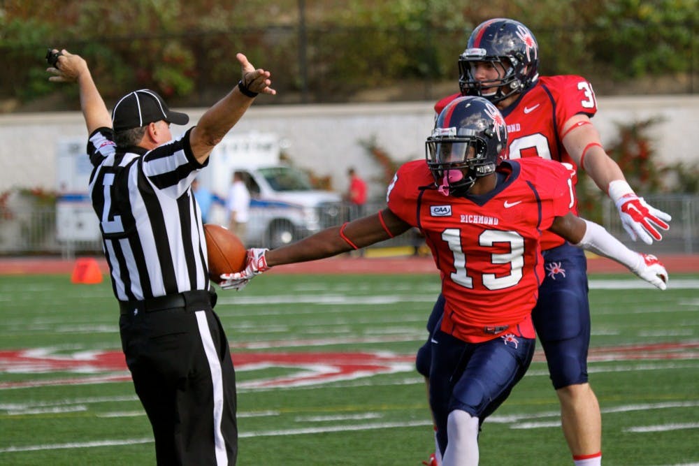 <p>David Jones after recovering a Rhode Island fumble.</p>