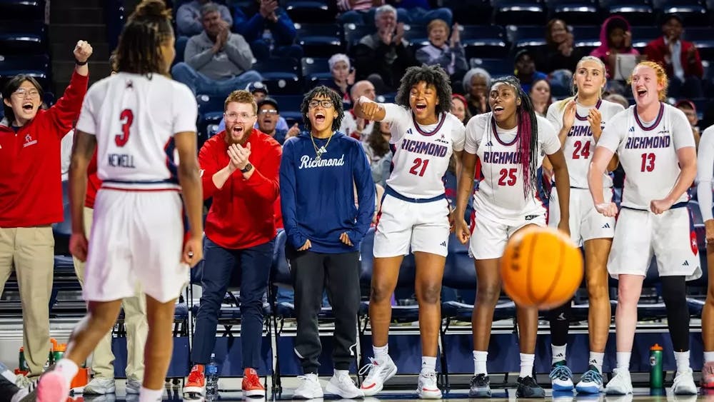 <p>Women's basketball team cheered on sophomore guard Alicia Newell. Courtesy of Richmond Athletics.</p>