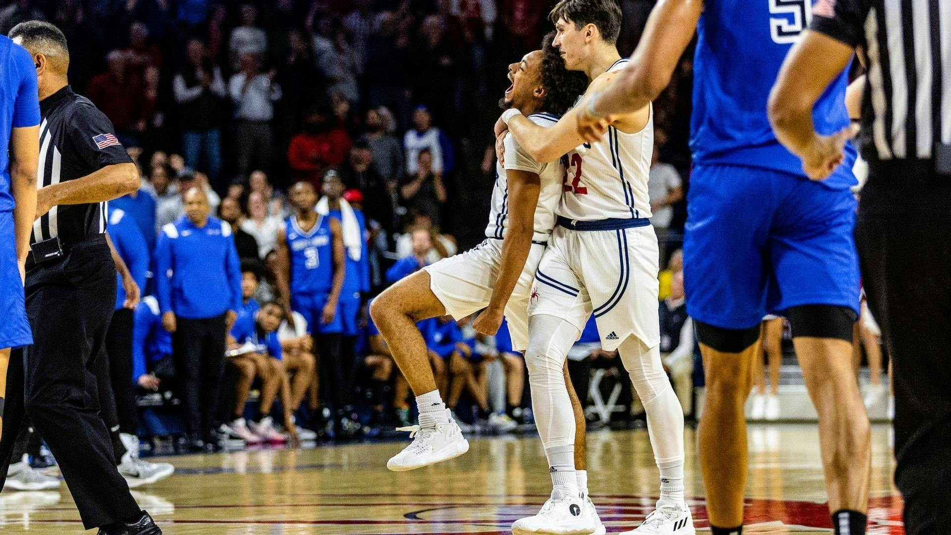 Redshirt first-year guard Jason Nelson celebrates after shooting at the Robins Center on Feb. 21.&nbsp;