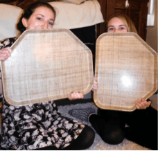 "The first thing that I would suggest is investing in a D-hall tray to use for sledding," Elle writes.