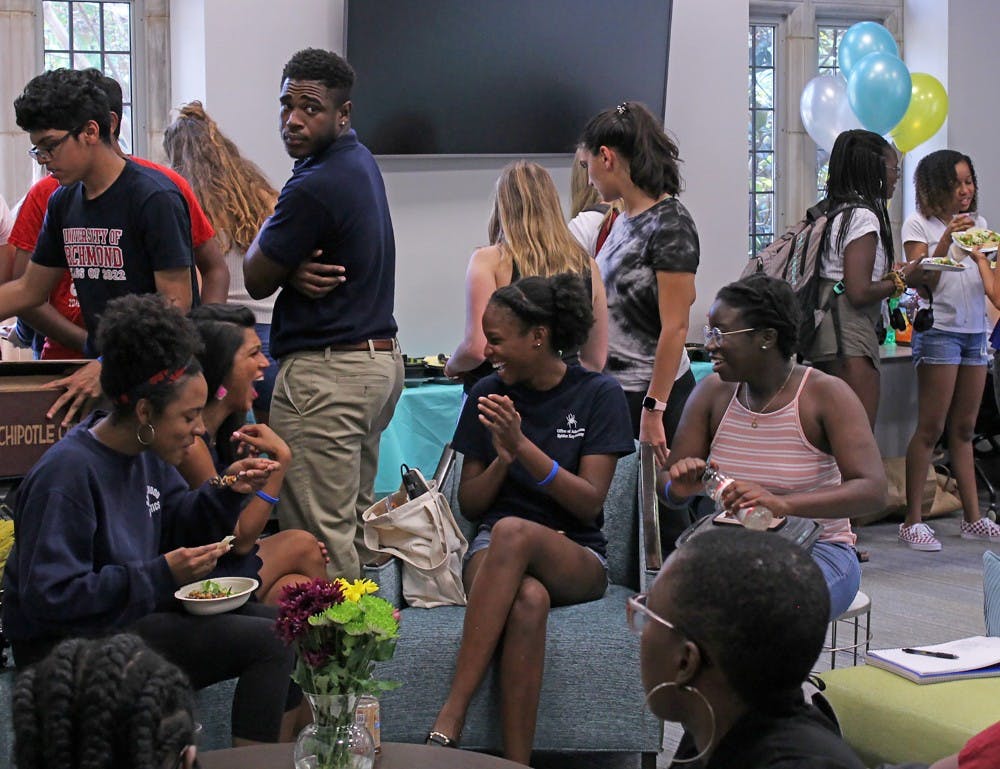Students, faculty and staff gather in the new Multicultural Space to celebrate the grand opening of “The Space.”&nbsp;