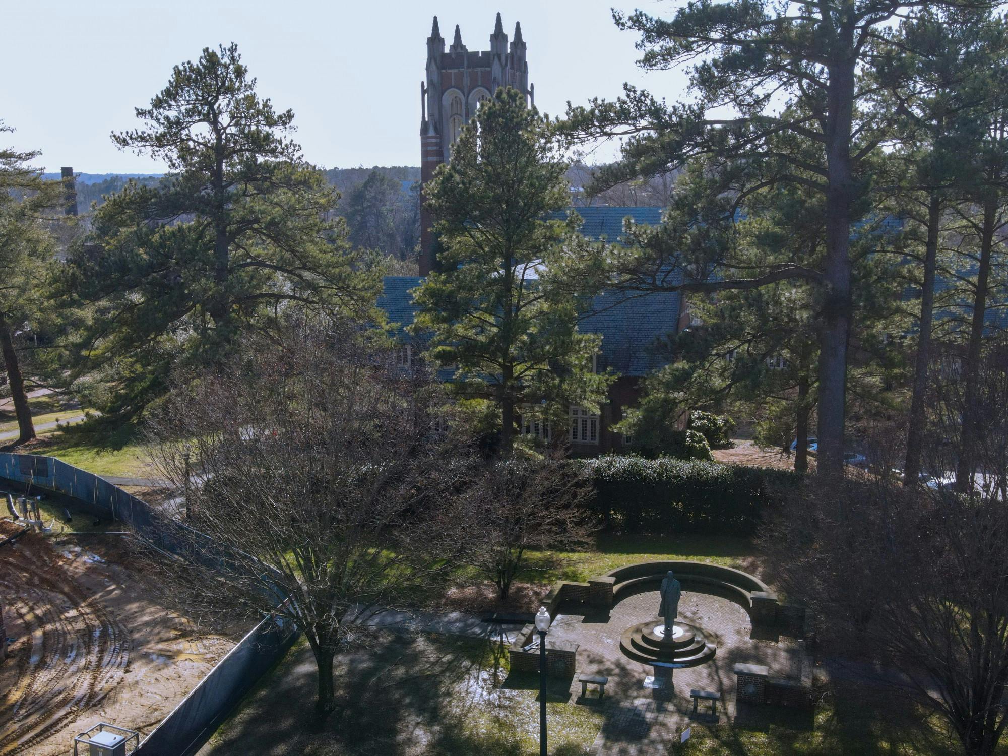 The statue of philanthropist E. Claiborne Robins stands before Boatwright Memorial Library.