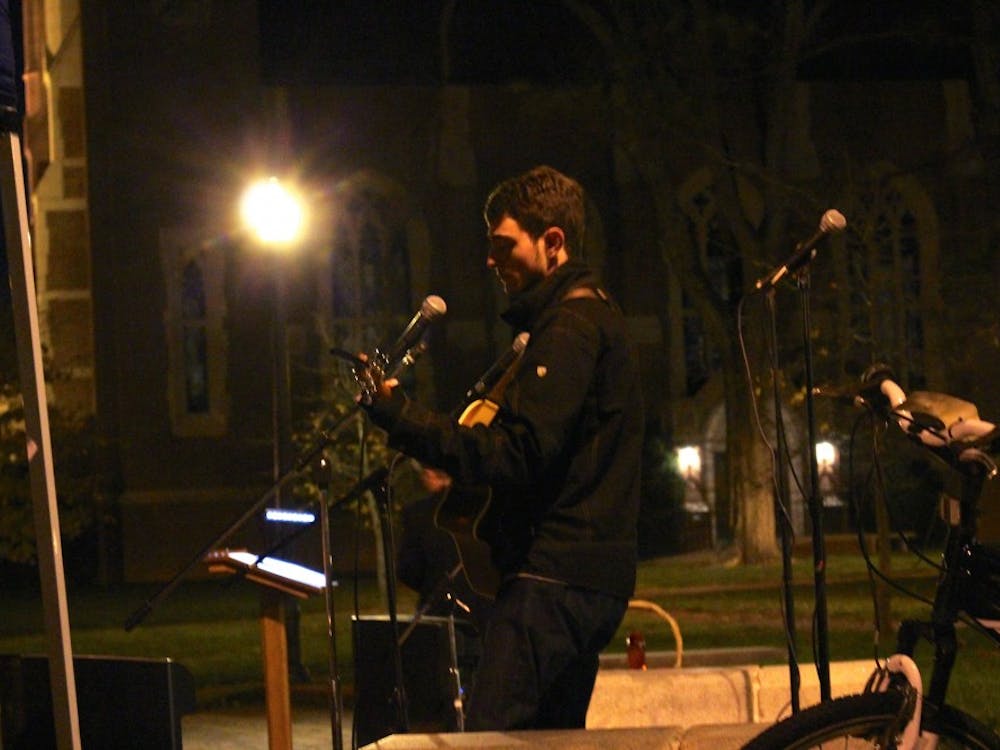 Richmond students gather on The Forum in a candlelight vigil for peace following the recent acts of terror in Paris, Beirut and around the world. Chaplain Kocher spoke and the crowd observed a minute of silence. Three songs were also performed.