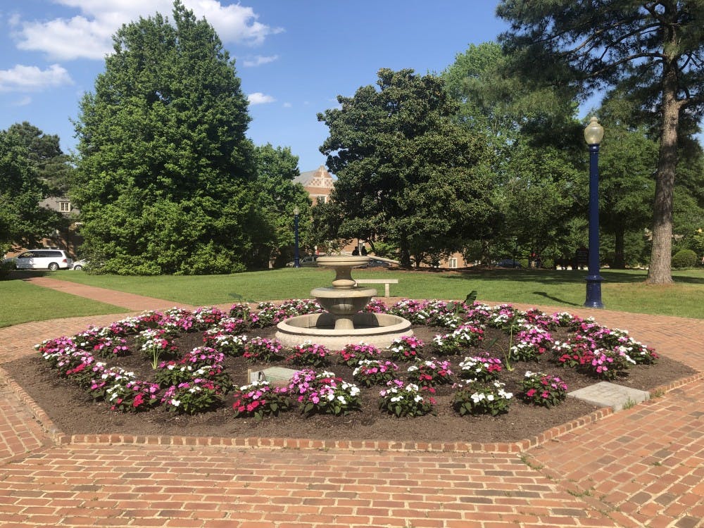 <p>Beds of flowers planted in the Westhampton Green.</p>