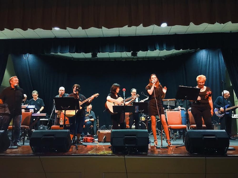 <p>Sophomore Kayla Saltzman singing at Stonebridge Clubhouse in Monroe Township, New Jersey, in July 2018.<em> Photo courtesy of Kayla Saltzman.&nbsp;</em></p>