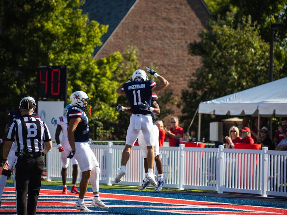 Wide Receiver Nick DeGennaro celebrates a touchdown during the University of Richmond's 38-6 win over Delaware State on Sept. 16 at Robins Stadium. Photo by Joseph Jeon.