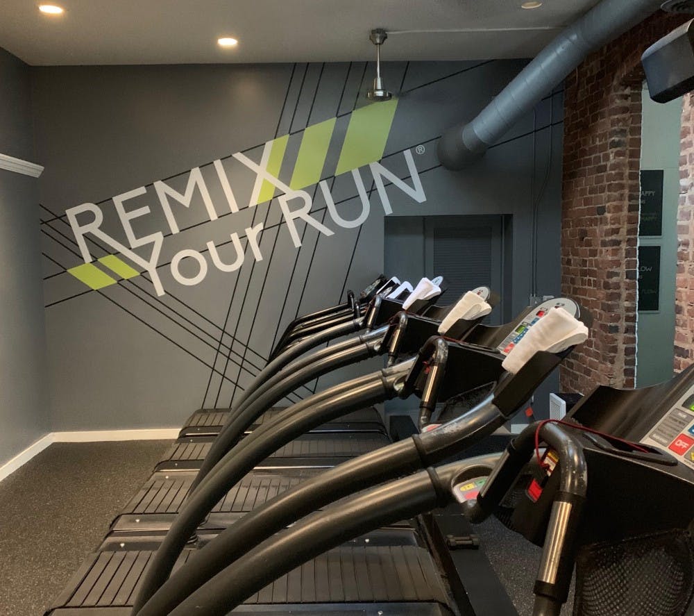 <p>A line of treadmills at Tread Happy, a boutique fitness studio in Richmond's Fan District.&nbsp;</p>