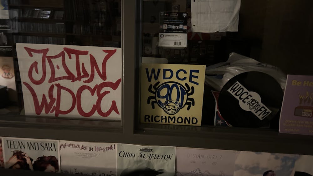 Promotional signs for WDCE, the University of Richmond's campus radio station. Courtesy of WDCE 90.1 FM