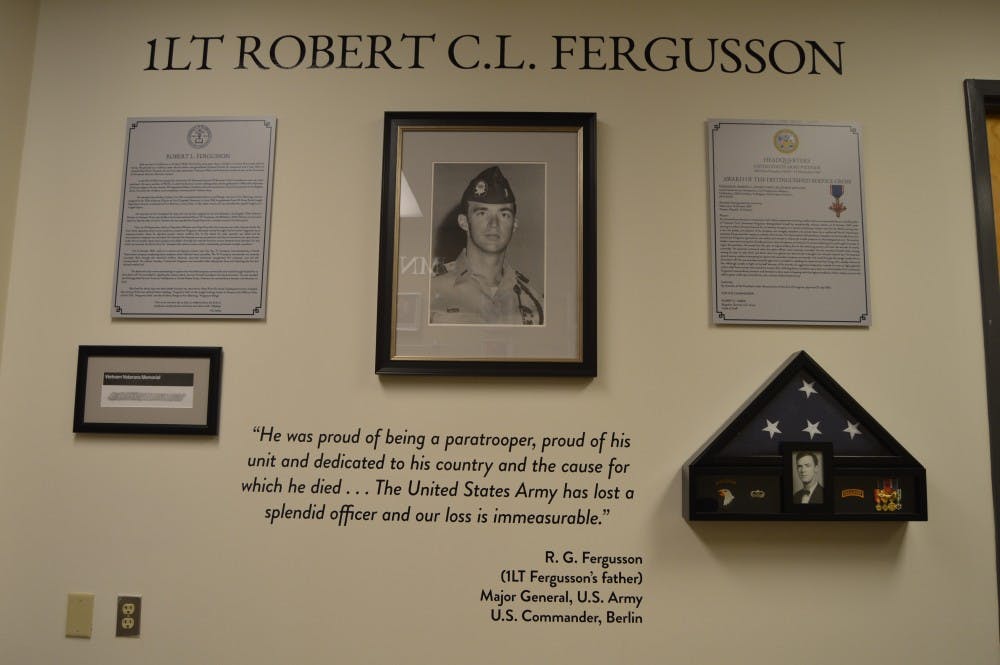 The dedication wall for Lt. Robert “Bob” Fergusson located in the Millheiser Gymnasium.&nbsp;