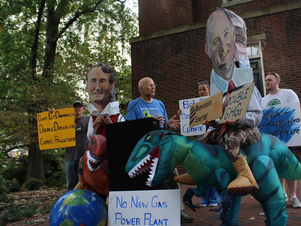 Member of Third Act Glen Besa speaks to protestors about how harmful the peaker plant can be in late October.