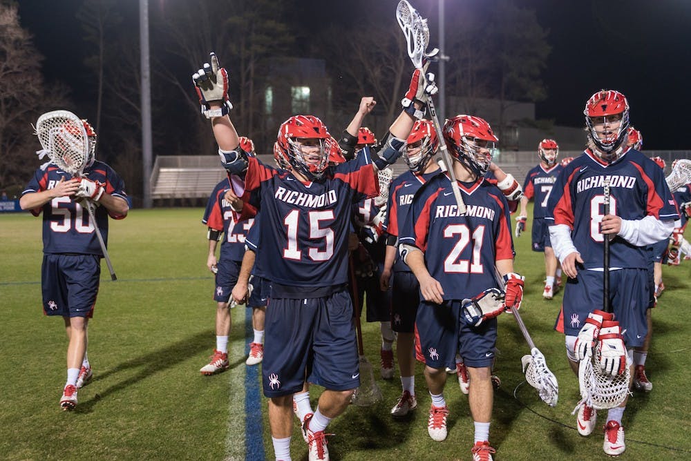 No. 15&nbsp;A.J. Lapitino and the Spiders celebrate&nbsp;the most impressive victory in program history | Photo courtesy of Spider Athletics