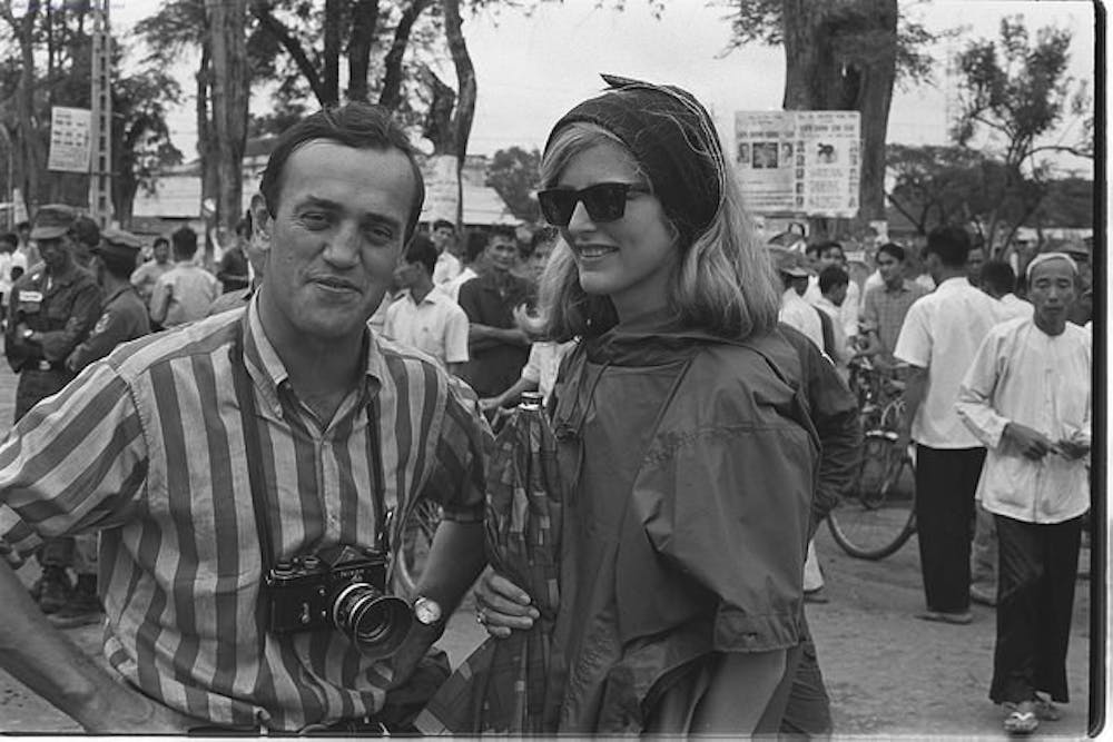 <p>Associated Press reporters Peter Arnett and Kelly Smith pose in Phong Dinh Province, Vietnam circa 1966.</p>