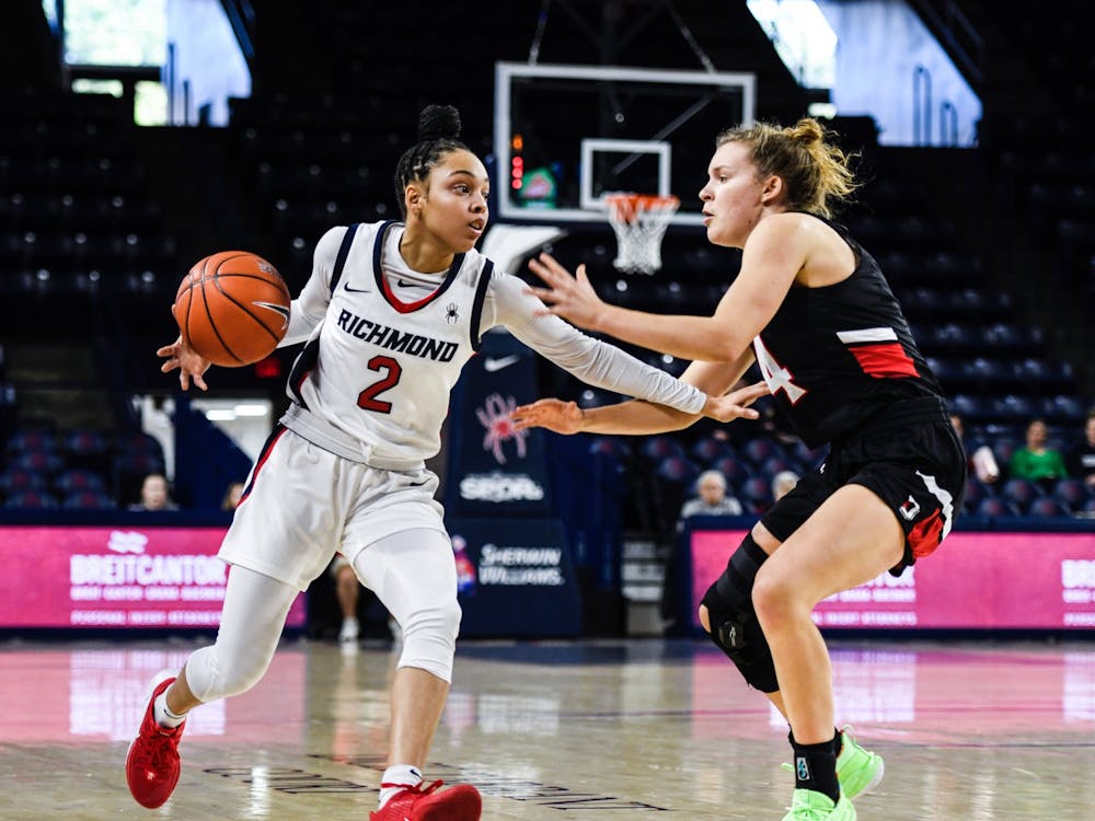 Sophomore guard Aniyah Carpenter looks to pass the ball during a game against Davidson in the Robins Center on January 26, 2020.